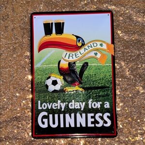 Guinness Toucan Sign with Black and Gold Accents